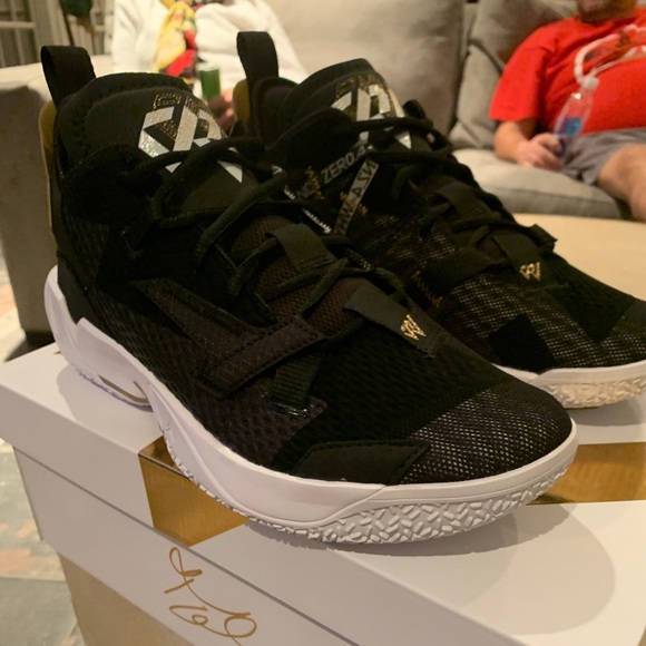 Jordan why not 4 family and friends black and gold